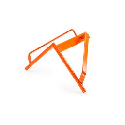 Oranž värvusega Bauroc metallist nurk, millel on ühe tugijalaga konstruktsioon.