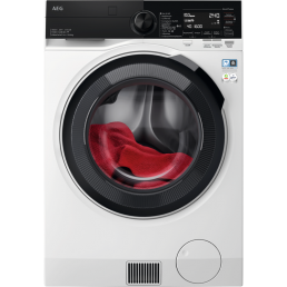 Vit och svart frontmatad tvättorkmaskin med stor rund glasdörr, synligt rött plagg inuti.