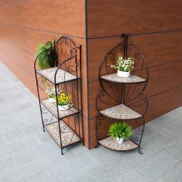 Metal shelf with a black frame, four stone mosaic shelves, an arched top, and a decorative pattern.