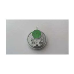 Green vacuum switch with a silver base and multiple connectors.