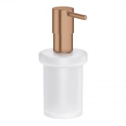 White liquid soap dispenser with a pump in a warm, brushed sunset color.