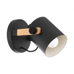 Musta seinävalaisin puuyksityiskohdalla, kartiomainen, sisältä valkoinen.