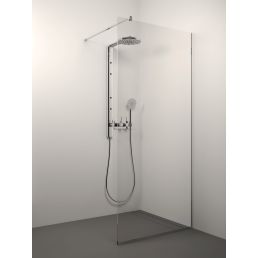 Transparent glass shower wall with a chrome frame, 600 mm wide and 2000 mm high, mounted between the floor and wall.
