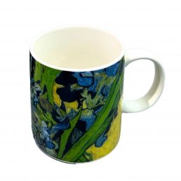 A white ceramic mug with a blue and green floral pattern on the outside, approximately 9.5 cm tall and with a 350 ml capacity.