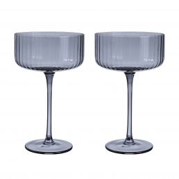 Two gray wine glasses with a ribbed pattern, high slender stems, and wide round bowls, height 17 cm.