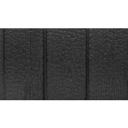 Musta värvi põletatud puidust fassaadilaudis, millel on nähtavad aastarõngad ja detailne tekstuur.