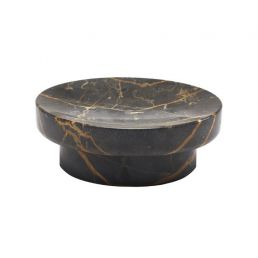 Black marble tray with golden patterns.