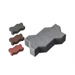 Fyra betonggatstenar med åttkantig form i grått, svart, rött och brunt. En stor sten i förgrunden, tre mindre till vänster.