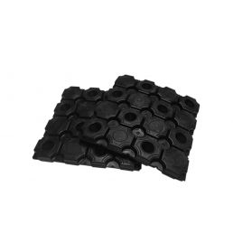 Black hexagonal-shaped vibration damping pads, arranged together to form a contact surface.