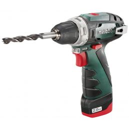 Green and black cordless drill with a silver drill bit, a red trigger, and an ergonomic handle.