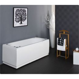 A white rectangular bathtub is positioned in a modern bathroom with gray walls, decorated with a black-and-white picture and a golden corner shelf.