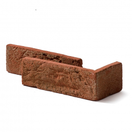 Kaks punast telliskivistiilis dekoratiivkivi, mõeldud nurkade viimistlemiseks.