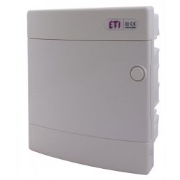 Valkoinen suorakulmainen ETI-upotettava paneeli, pyöreä nappi oikeassa yläkulmassa.