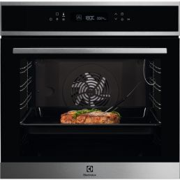 Built-in oven in black and silver with a digital control panel, a piece of meat on a tray inside, and a visible cooking probe.