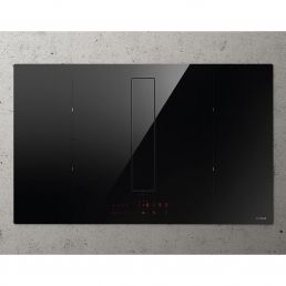 Rectangular black glass hob with an integrated extractor and touch controls in the center.