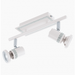 Vit LED-spotlight med två spotlights och en hylla dekorerad med kristallstenar.