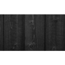 Musta värvi põletatud puidust fassaadilaudis, mis näitab selgeid puusüü mustreid ja tekstuuri.