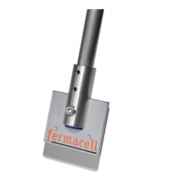 Glue remover with a metal handle and a gray rectangular end featuring a blue dot and 'fermacell' logo.