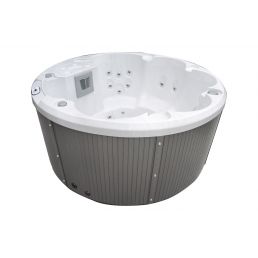 White hexagonal mini-pool with gray side panels, equipped with multiple jets and a digital control panel.