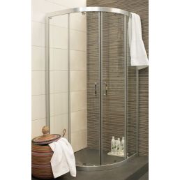 Modern curved shower corner with clear glass doors and metal handles, installed in a tiled bathroom.