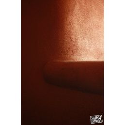 Mörkbrun lerklistningsblandning för halmhus, förpackad i 25 kg.