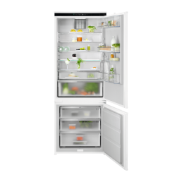 Valge 3-ukseline integreeritav külmik, paljude riiulite ja sahtlitega, täis puuvilju ja köögivilju.