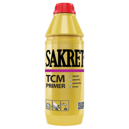Gul Sakret TCM Primer tvåkomponentsprimer i plastflaska med röd kork, etiketten visar användningsinstruktioner och varumärkeslogo.