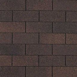 Bruna trelagers asfalttakpannor med ett traditionellt fiskbensmönster.