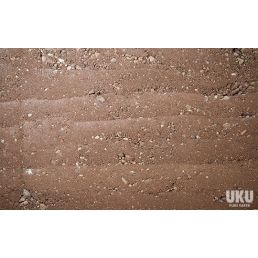 Massiv lervävningsmix (tampslermix) i 25 kg säck; huvudsakligen brun och innehåller olika sten- och mineralpartiklar.