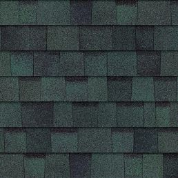 Asfalttakpannor i nyanser av grönt. Olika gröna nyanser skapar ett mönstrat utseende.