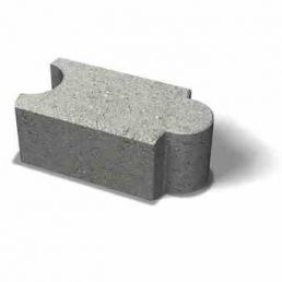 Grafitgrå tegelsten med böjd överdel.